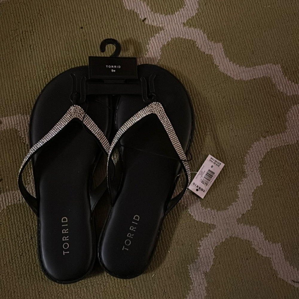 Black bling sandals.  Never worn